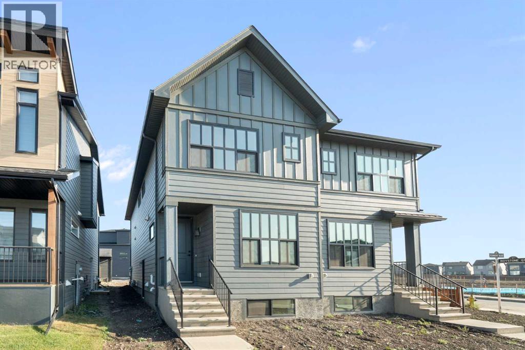 552 Rowmont Boulevard Nw, Calgary, Alberta  T3L 0L6 - Photo 2 - A2258333