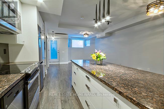 Lower Level - 49 Mcgee Street, Toronto, Ontario  M4M 2L1 - Photo 6 - E12592696