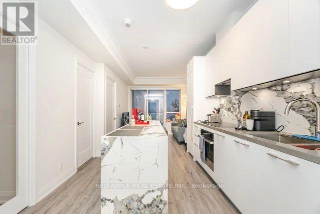 1207 - 18 Water Walk Drive, Markham, Ontario  L3R 6L5 - Photo 7 - N12592146