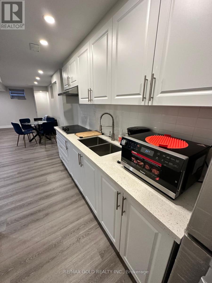 Basement - 961 Asleton Boulevard, Milton, Ontario L9T 8K3 - Photo 10 - W12591610