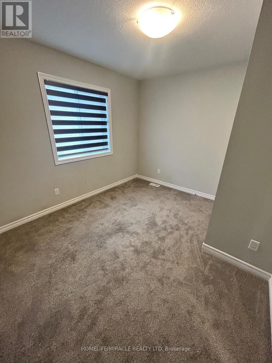 174 Forest Creek Drive, Kitchener, Ontario N2R 0M1 - Photo 16 - X12592614