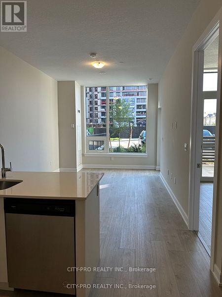 103 - 3200 William Coltson Avenue, Oakville, Ontario L6H 7W6 - Photo 2 - W12592972