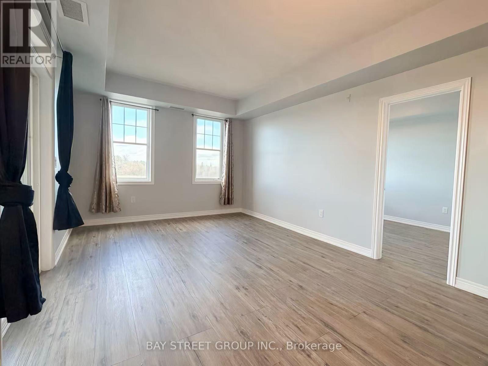 202 - 276 Gatwick Drive, Oakville, Ontario  L6H 6V2 - Photo 7 - W12593484