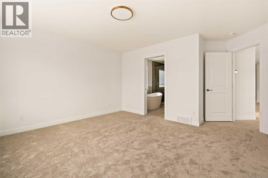 529 Lucas Way Nw, Calgary, Alberta  T3P 2E7 - Photo 31 - A2268760