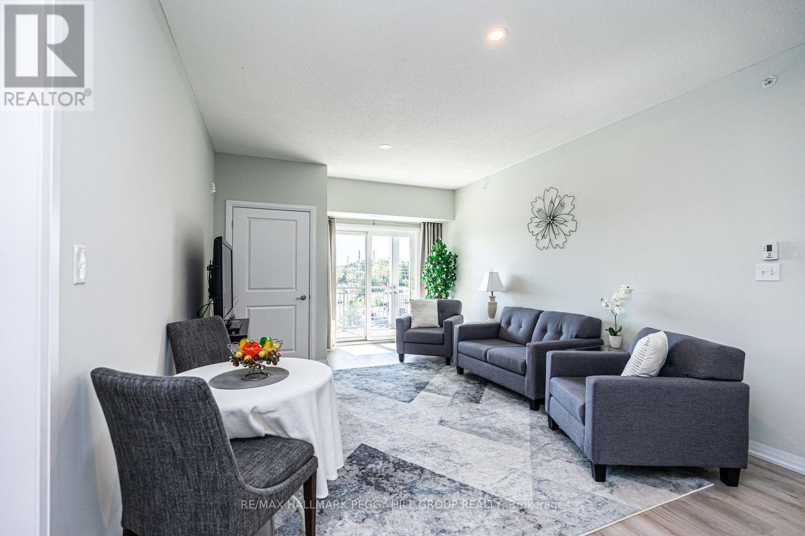 404 - 295 Cundles Road E, Barrie, Ontario  L4M 0K8 - Photo 2 - S12593620