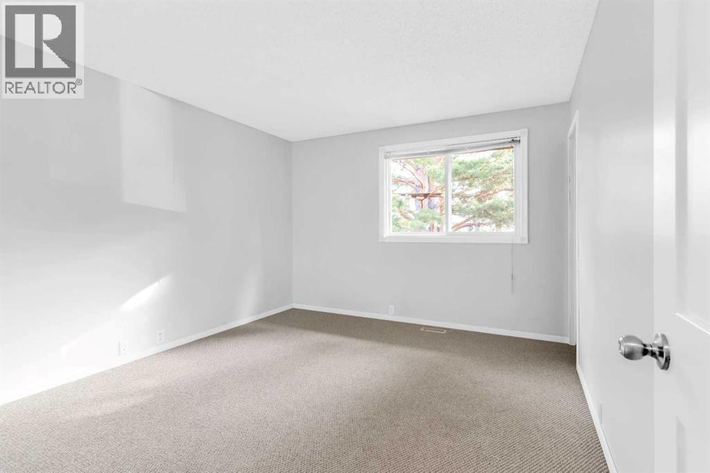 968 Bracewood Rise Sw, Calgary, Alberta  T2W 3C9 - Photo 9 - A2268511