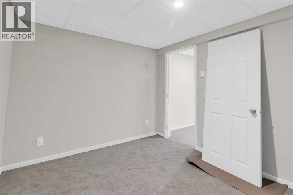 968 Bracewood Rise Sw, Calgary, Alberta  T2W 3C9 - Photo 24 - A2268511