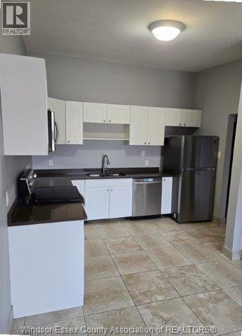 MLS# 25020639: 227 LAUZON Unit# 2, Windsor, Canada