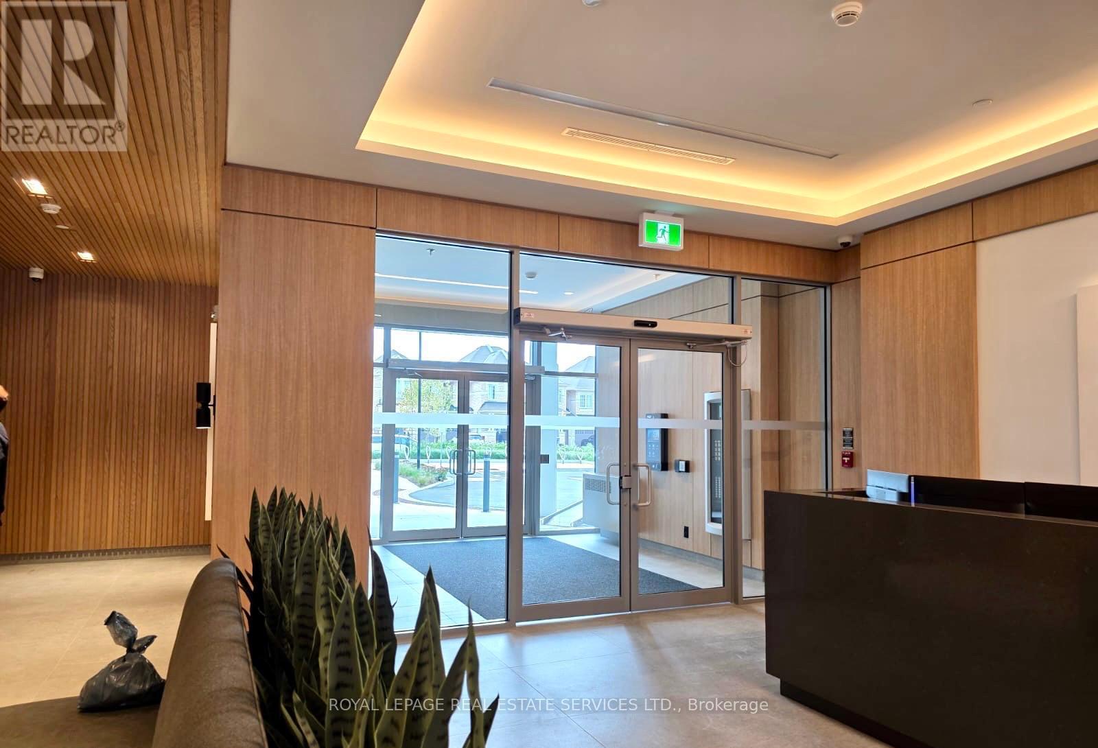 516 - 3250 Carding Mill Trail, Oakville, Ontario  L6M 1L3 - Photo 3 - W12594032