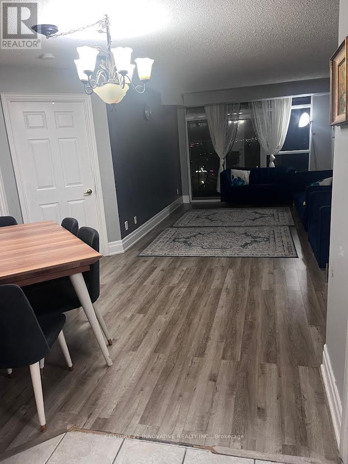 1408 - 35 Kingsbridge Garden Circle, Mississauga, Ontario  L5R 3Z5 - Photo 3 - W12594312