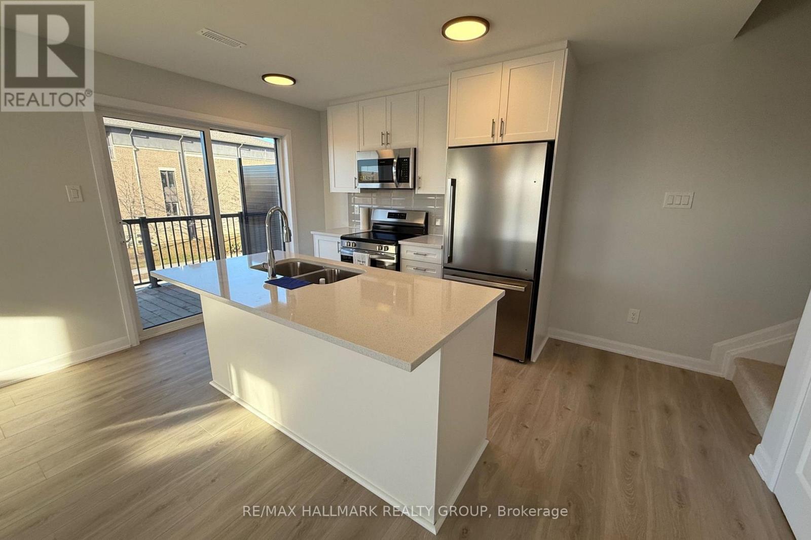 #11 - 701 Glenroy Gilbert Drive, Ottawa, Ontario K2J 7N8 - Photo 2 - X12595038