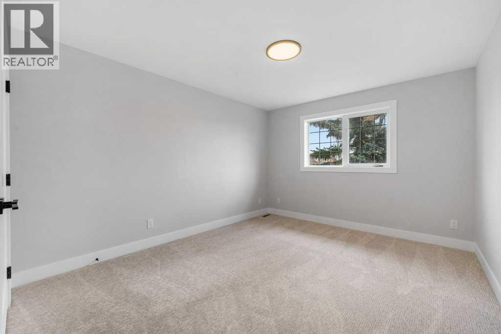 711 Mckenzie Lake Bay Se, Calgary, Alberta  T2Z 2J2 - Photo 35 - A2267695