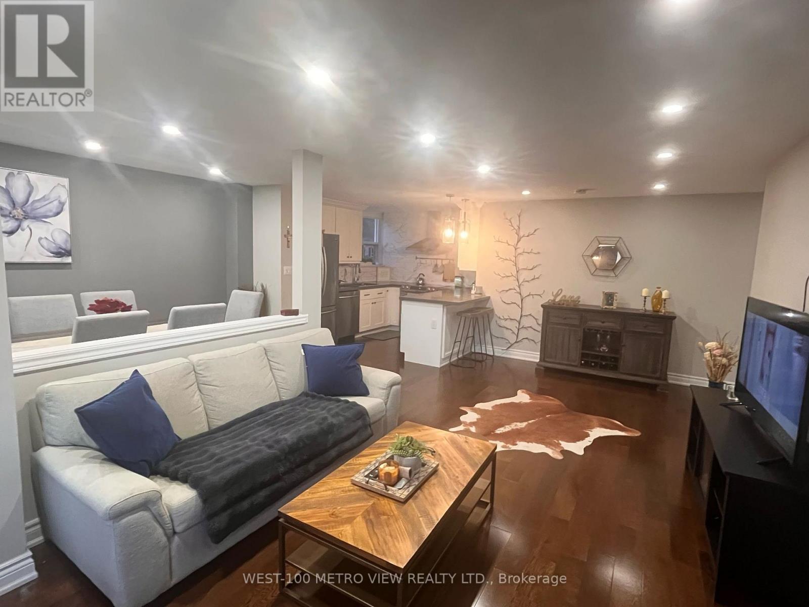 202 - 1415 Ghent Avenue, Burlington, Ontario  L7S 1X4 - Photo 1 - W12595040