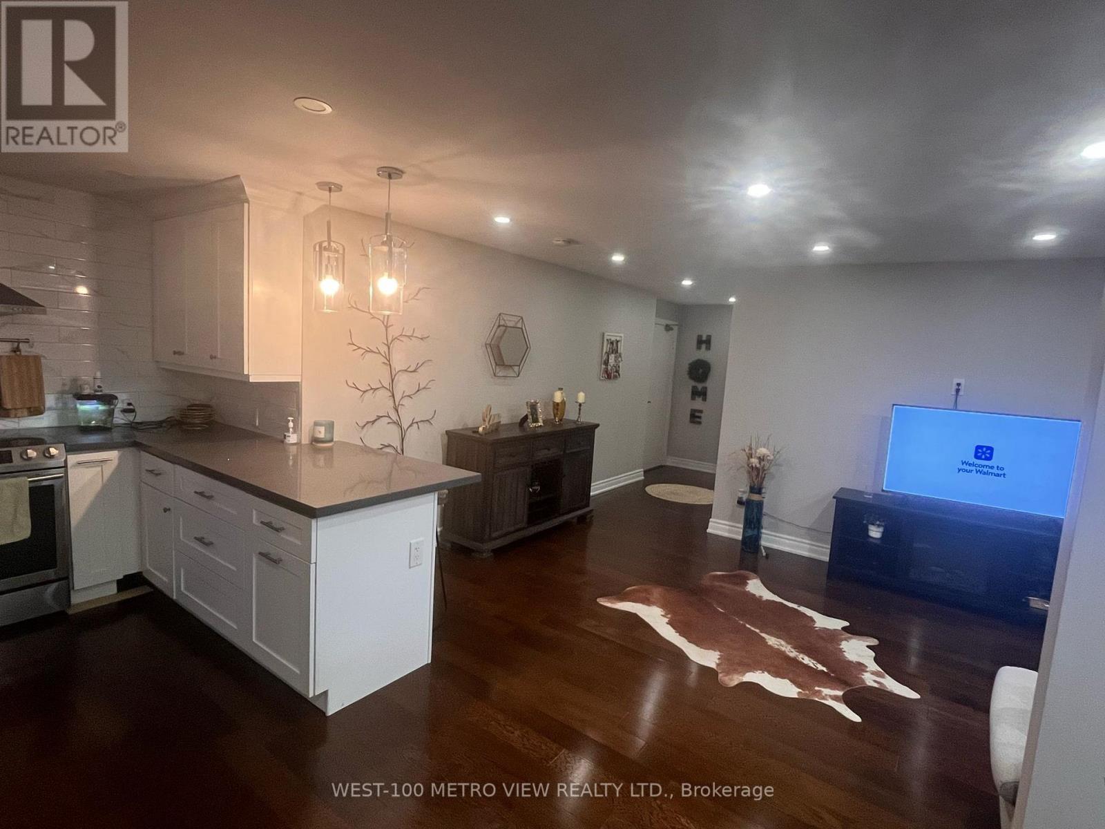 202 - 1415 Ghent Avenue, Burlington, Ontario  L7S 1X4 - Photo 4 - W12595040