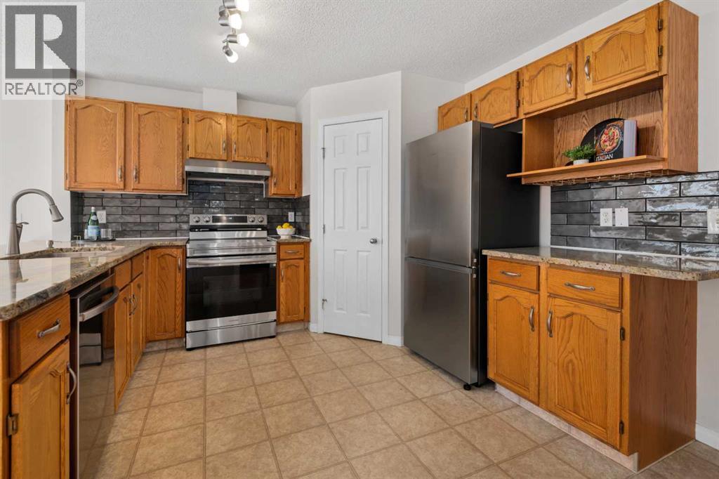 108 Hidden Creek Rise Nw, Calgary, Alberta  T3A 6L5 - Photo 5 - A2254321