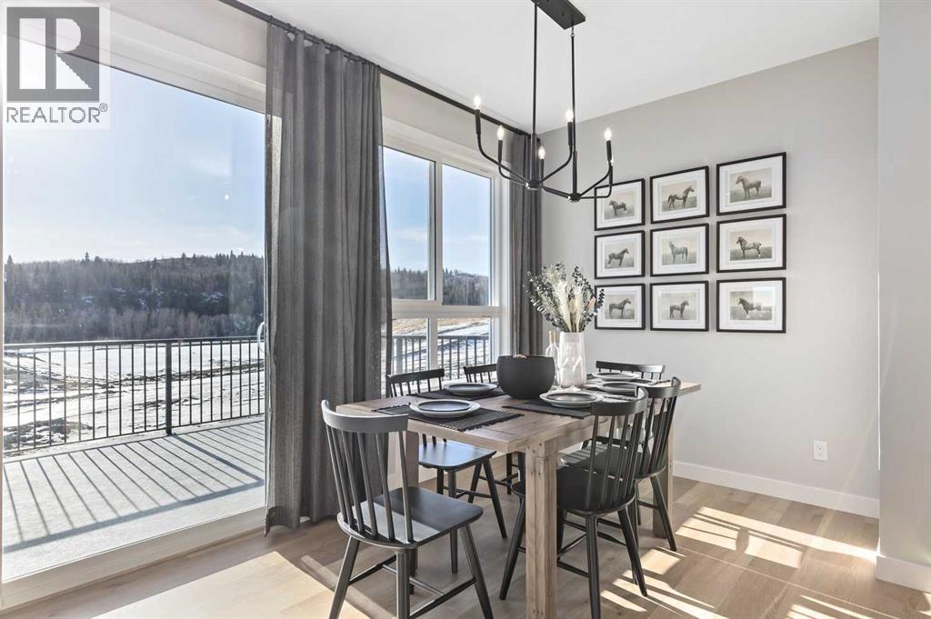 8 Creekview Manor Sw, Calgary, Alberta  T2X 5Y3 - Photo 3 - A2272088