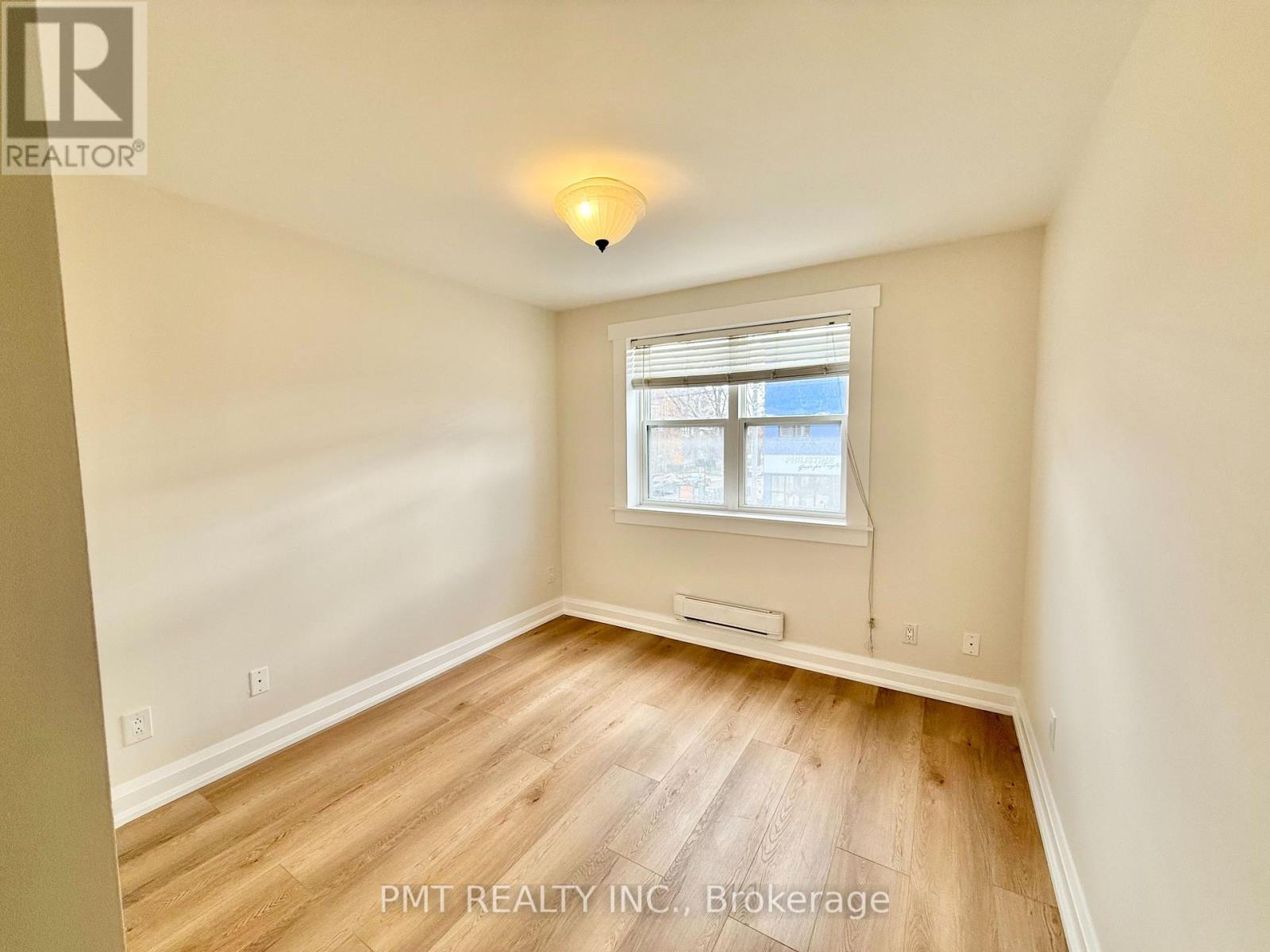 Upper - 1164 Queen Street E, Toronto, Ontario M4M 1L4 - Photo 4 - E12595440