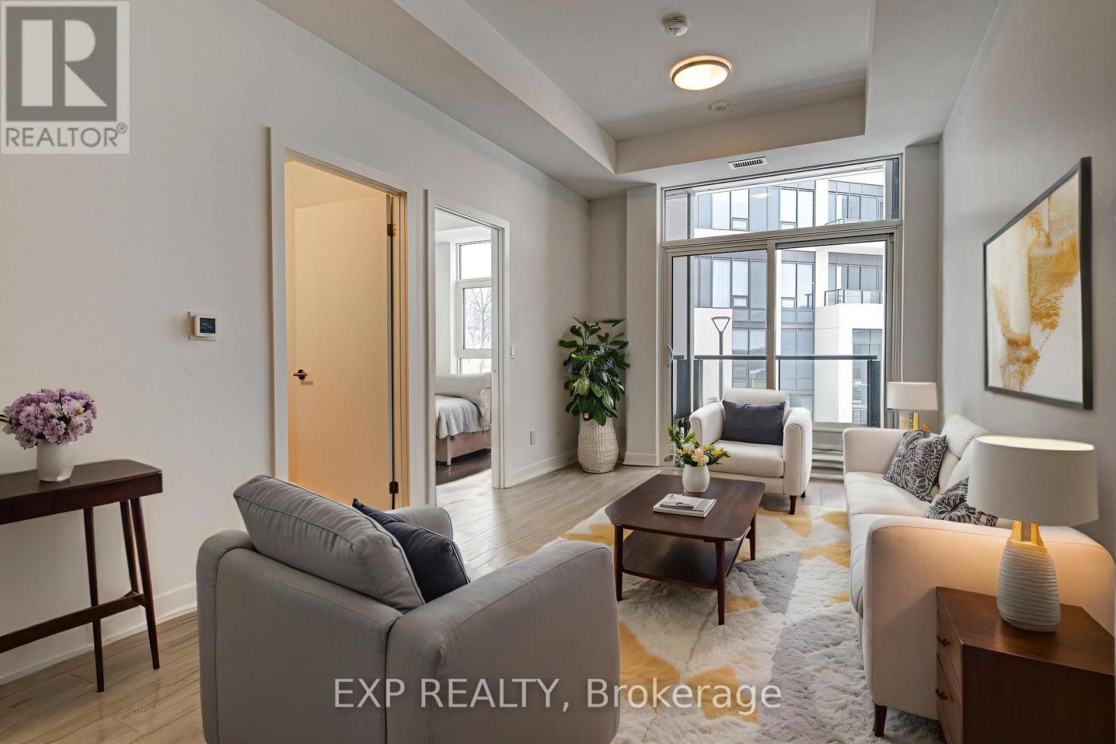 209 - 25 Wellingtont Street S, Kitchener, Ontario  N2G 0G5 - Photo 2 - X12595398