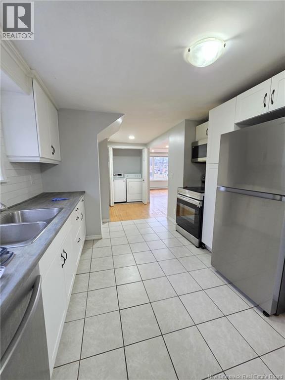 167 Elmwood Drive, Moncton, New Brunswick  E1A 1X2 - Photo 3 - NB130412