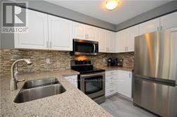 1086 Sprucedale Lane, Milton, Ontario  L9T 5P7 - Photo 6 - W12595630