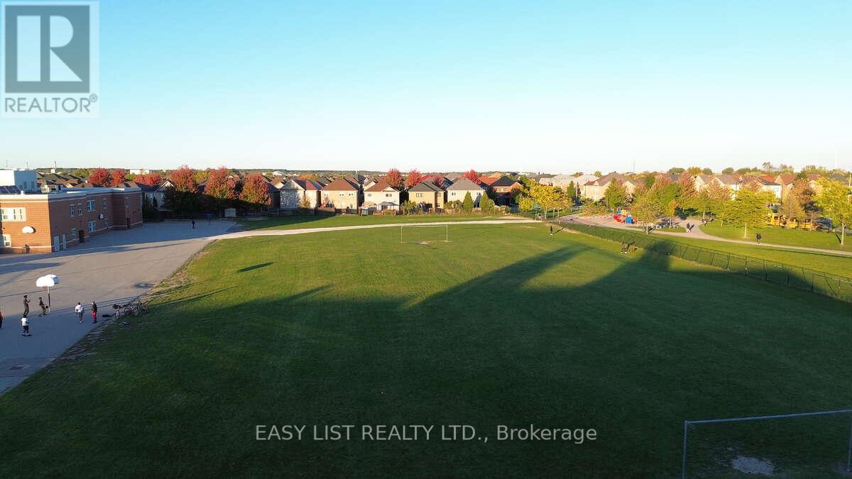 71 Beavervalley Drive, Brampton (Fletcher's Meadow), Ontario  L7A 3R3 - Photo 10 - W12595986