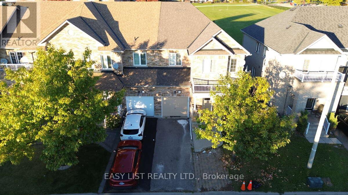 71 Beavervalley Drive, Brampton (Fletcher's Meadow), Ontario  L7A 3R3 - Photo 3 - W12595986