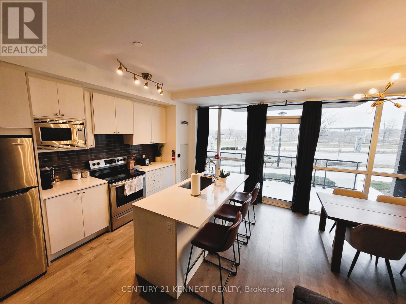 Th2 - 60 George Butchart Drive, Toronto, Ontario  M3K 0E1 - Photo 5 - W12596046