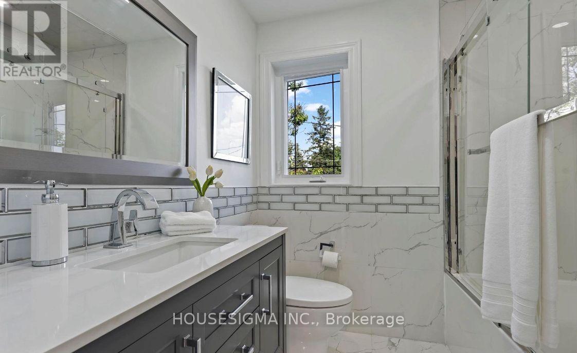 90a Bicknell Avenue, Toronto, Ontario M6M 4G7 - Photo 13 - W12596110