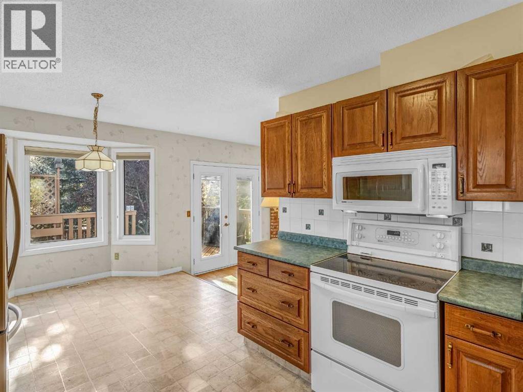 76 Wood Valley Rise Sw, Calgary, Alberta  T2W 5S5 - Photo 6 - A2253607