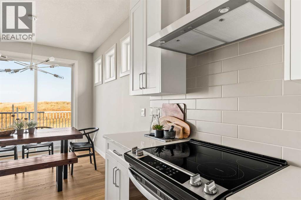 1168 Iron Ridge Avenue, Crossfield, Alberta  T0T 0T0 - Photo 6 - A2255632