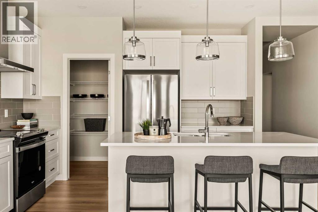 1168 Iron Ridge Avenue, Crossfield, Alberta  T0T 0T0 - Photo 11 - A2255632