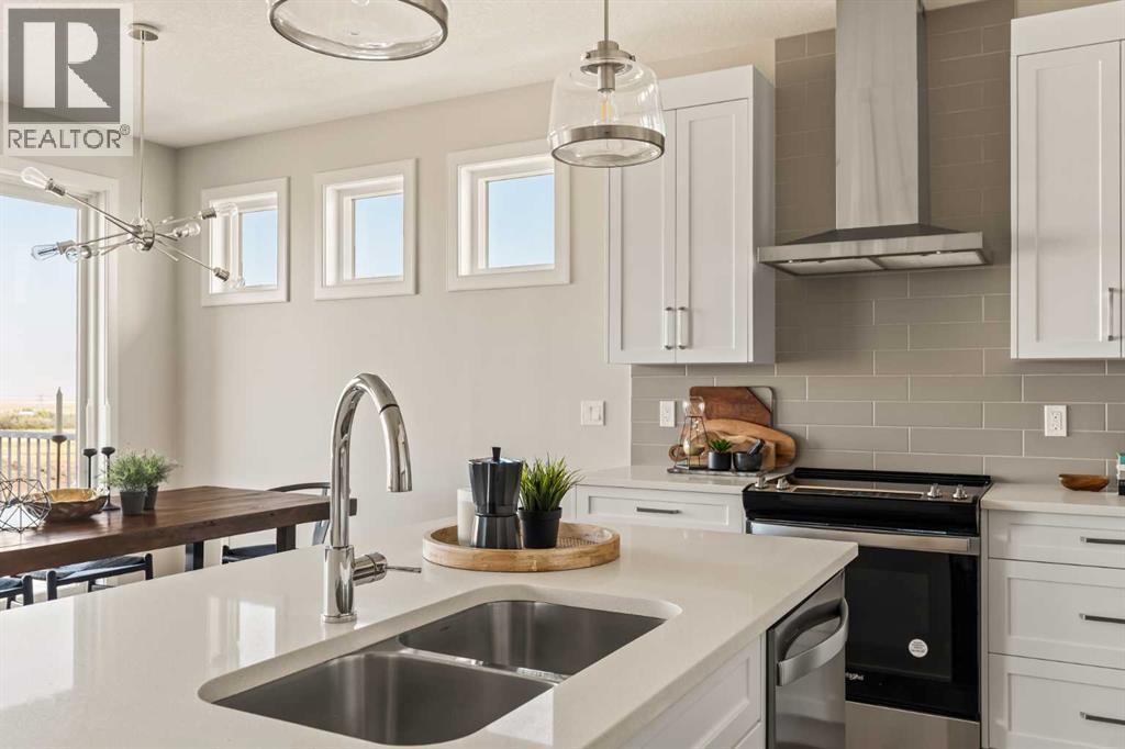 1168 Iron Ridge Avenue, Crossfield, Alberta  T0T 0T0 - Photo 5 - A2255632