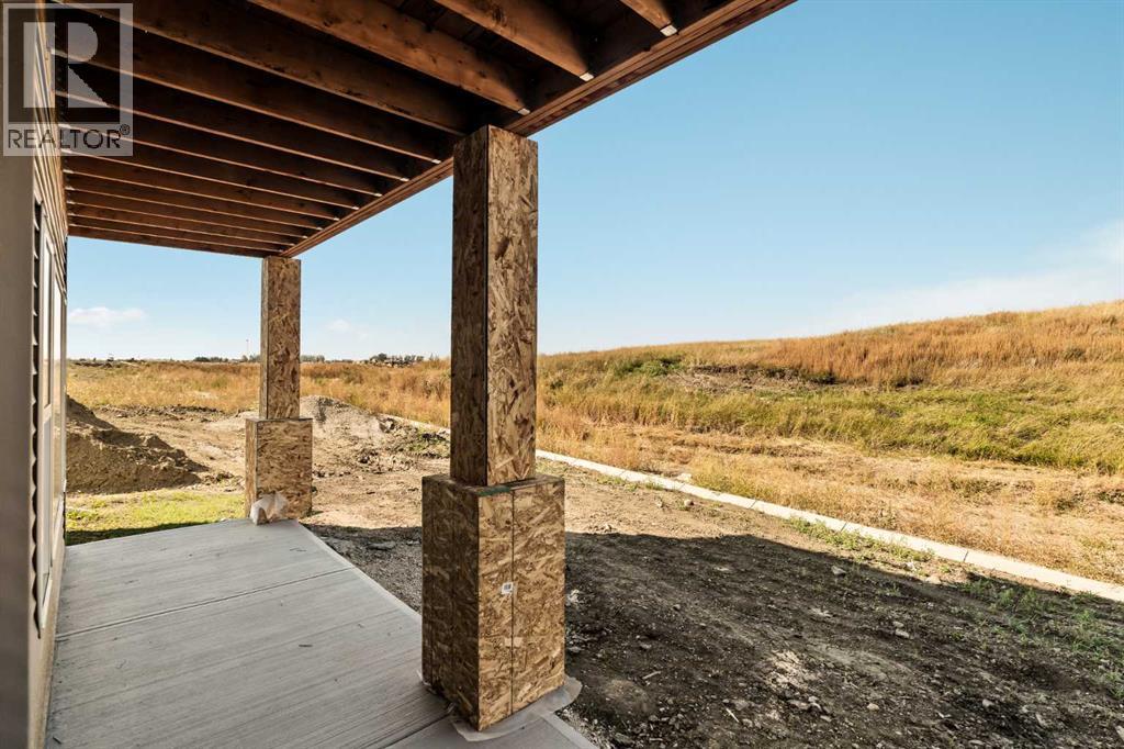 1168 Iron Ridge Avenue, Crossfield, Alberta  T0T 0T0 - Photo 49 - A2255632