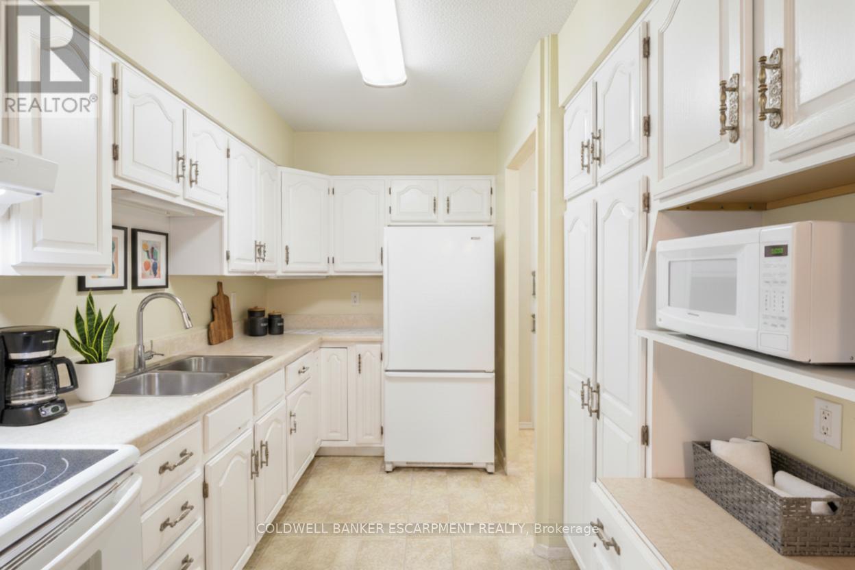 1005 - 81 Millside Drive, Milton, Ontario  L9T 3X4 - Photo 11 - W12596230