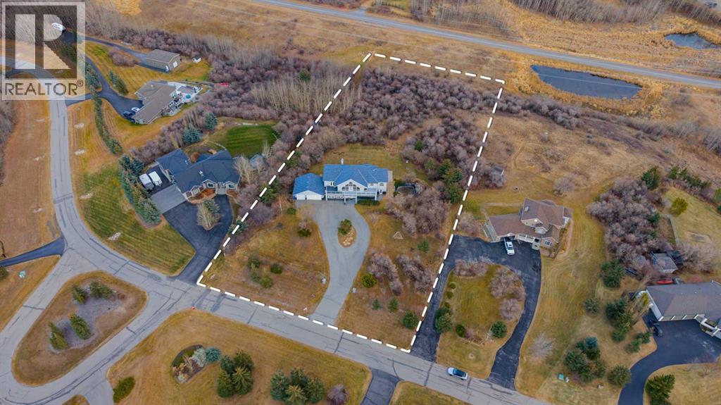 45 Lone Pine Crescent, Rural Rocky View County, Alberta  T3R 1B9 - Photo 3 - A2272407