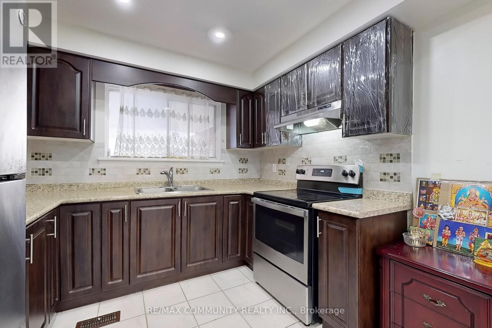 4 - 2451 Bridletowne Circle, Toronto, Ontario  M1W 2Y4 - Photo 6 - E12499578