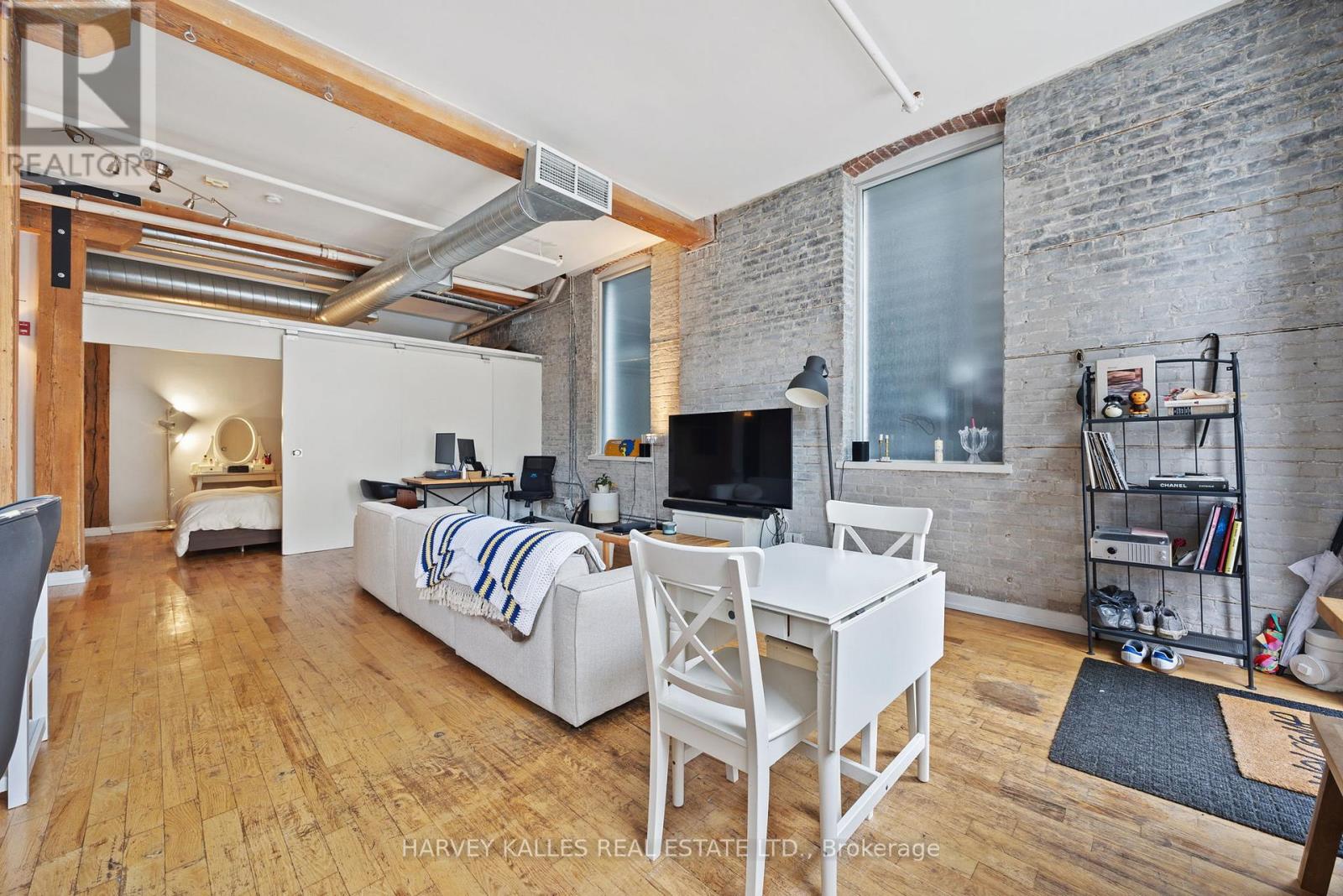 102 - 27 Brock Avenue, Toronto, Ontario  M6K 2K9 - Photo 4 - W12596960