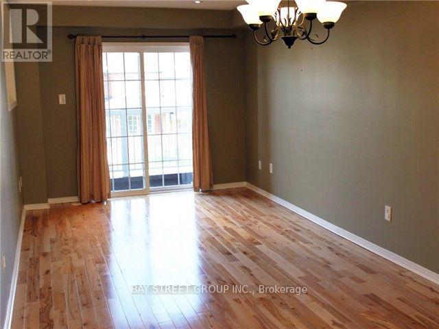 2321 Saddlecreek Crescent, Oakville, Ontario  L6M 5J7 - Photo 5 - W12597230