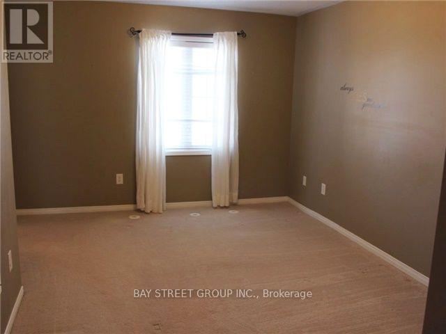 2321 Saddlecreek Crescent, Oakville, Ontario  L6M 5J7 - Photo 7 - W12597230