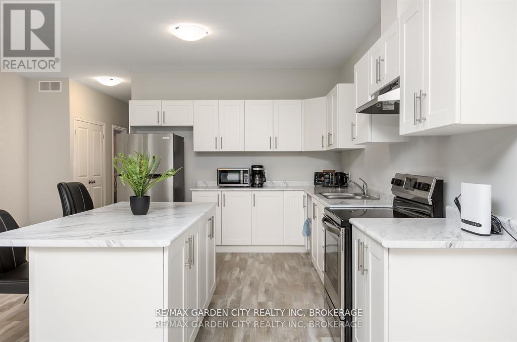 34 Bounty Avenue W, Thorold (Rolling Meadows), Ontario  L2V 0H3 - Photo 6 - X12597532