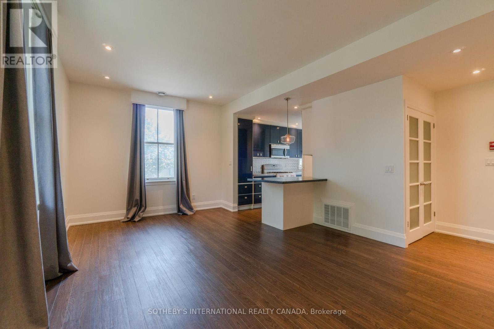 Unit 2 - 215-217 Carlton Street, Toronto, Ontario  M5A 2K9 - Photo 6 - C12405242