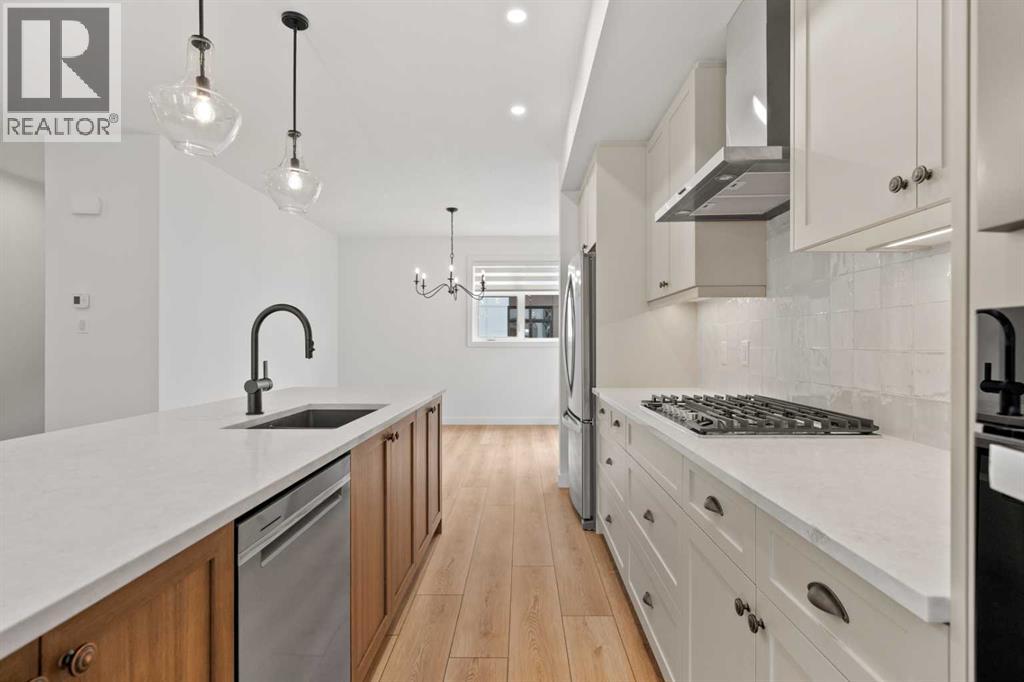 8349 8 Avenue Sw, Calgary, Alberta  T3H 4C6 - Photo 9 - A2255576