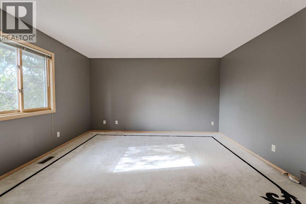 135 Canterbury Court Sw, Calgary, Alberta  T2W 6C1 - Photo 20 - A2261577