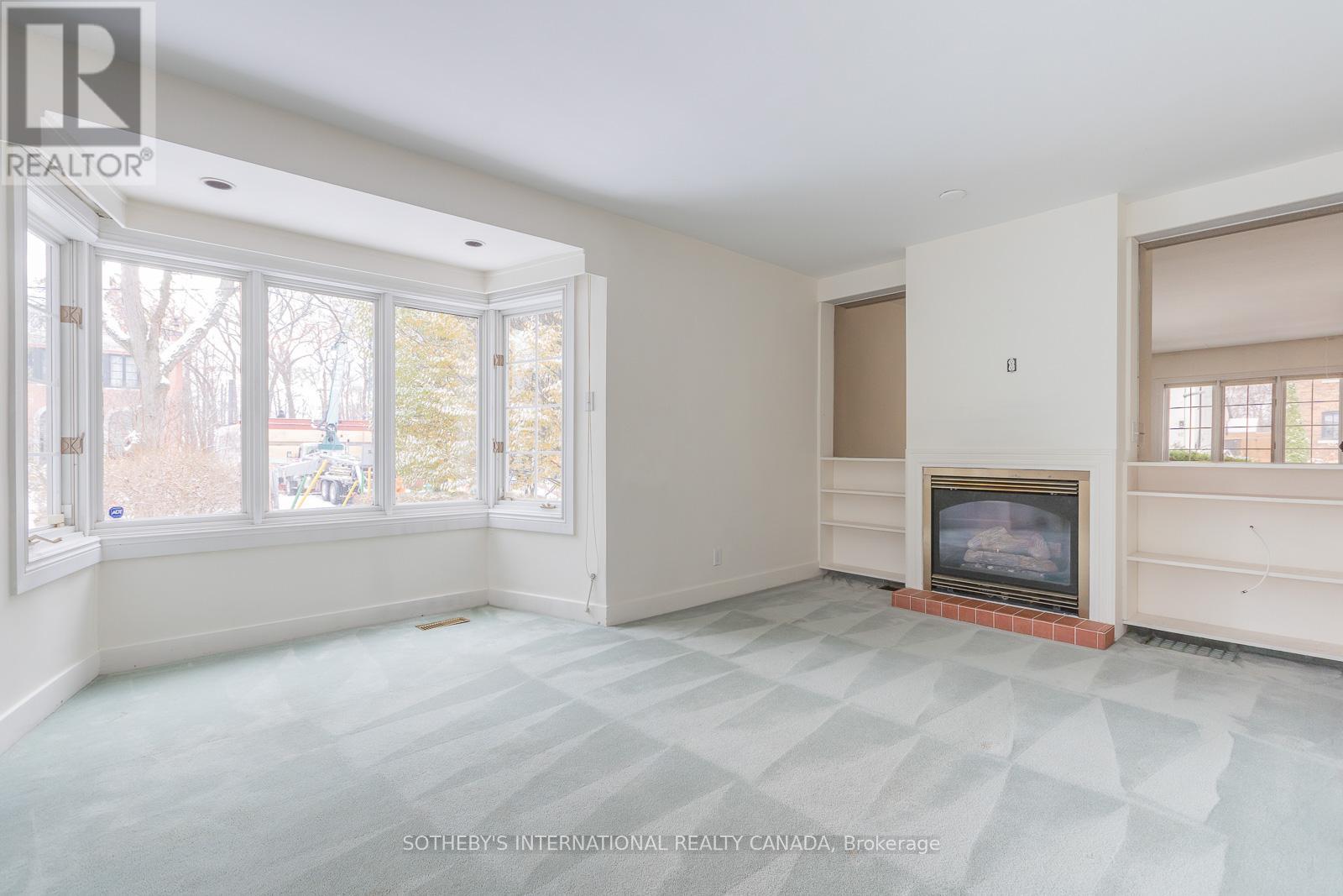 24 Douglas Crescent, Toronto, Ontario  M4W 2E7 - Photo 5 - C12598336