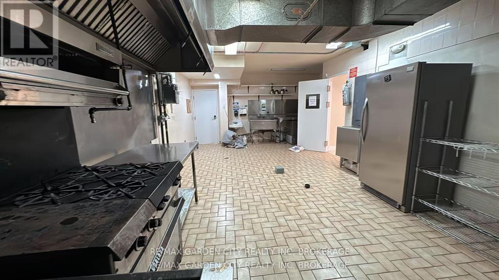 Commercial Unit - 7737 Lundy's Lane, Niagara Falls, Ontario  L2H 1H3 - Photo 10 - X12598578