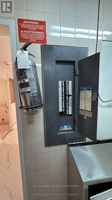 Commercial Unit - 7737 Lundy's Lane, Niagara Falls, Ontario  L2H 1H3 - Photo 4 - X12598578