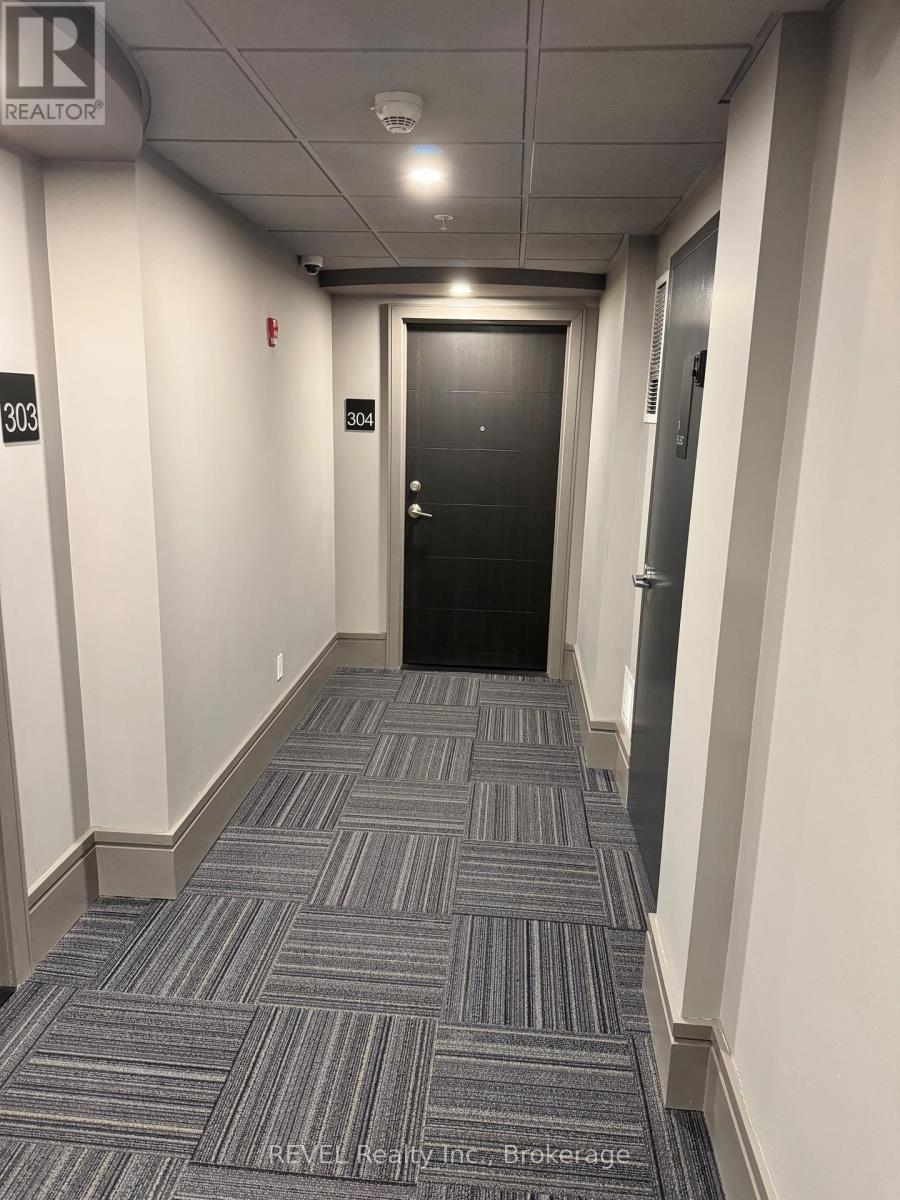 304 - 300g Fourth Avenue, St. Catharines, Ontario  L2S 0E6 - Photo 3 - X12522970