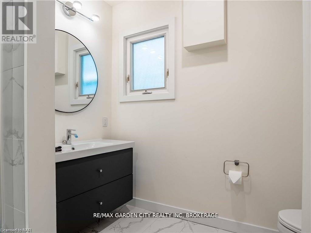 98 Pleasant Avenue, St. Catharines, Ontario  L2R 1Y1 - Photo 12 - X12598846