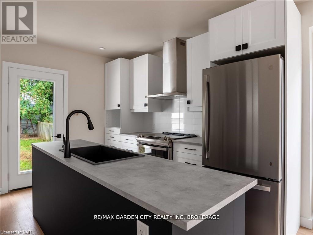 98 Pleasant Avenue, St. Catharines, Ontario  L2R 1Y1 - Photo 9 - X12598846