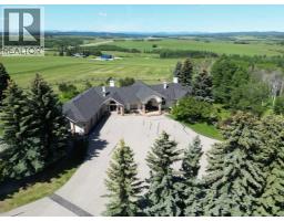 100, 182029 174 Avenue W, Priddis, Alberta
